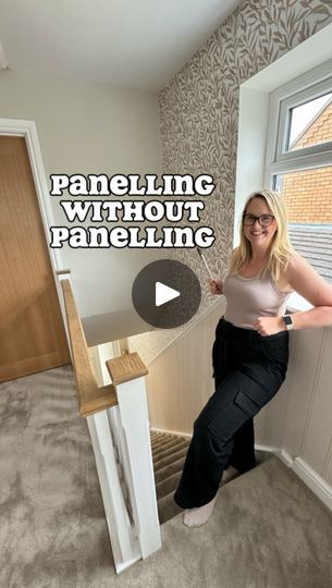 a woman sitting on top of a stair case in front of a window with the words paneling without paneling