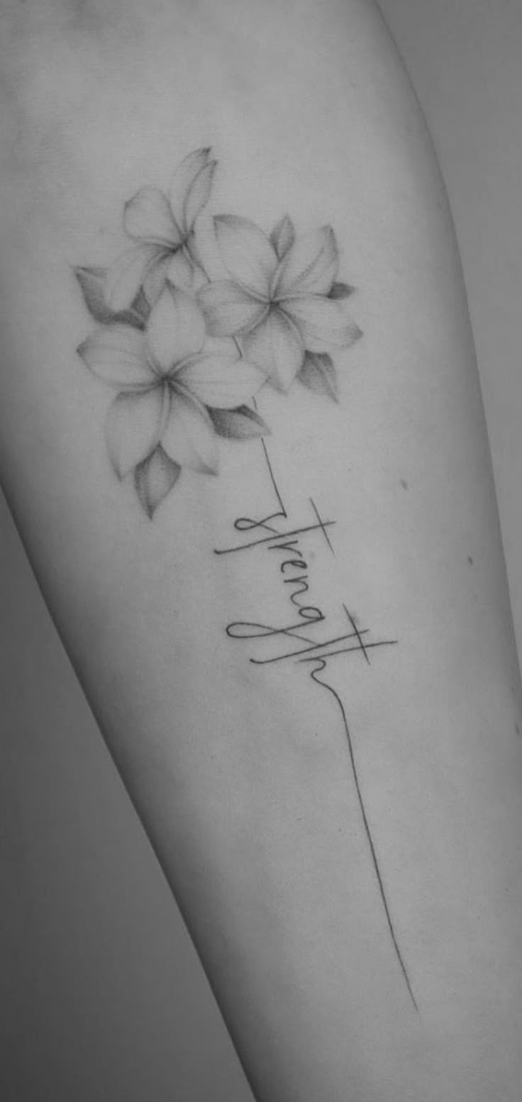 a black and white photo of a flower with the word faith on it's side