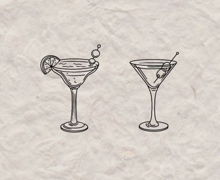 two martinis with olive garnish and an orange slice on the rim are drawn in black ink