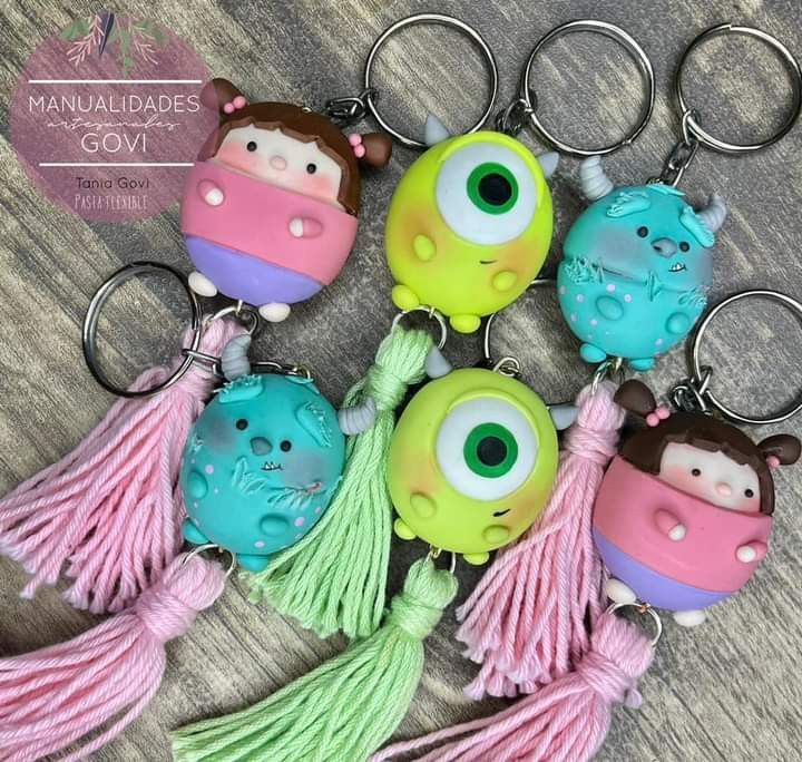 several key chains with different colored eyes and tassels