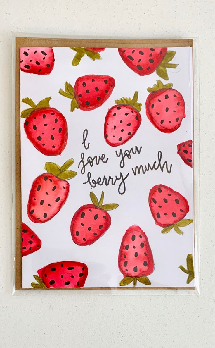 a card with strawberries on it and the words i love you berry munch