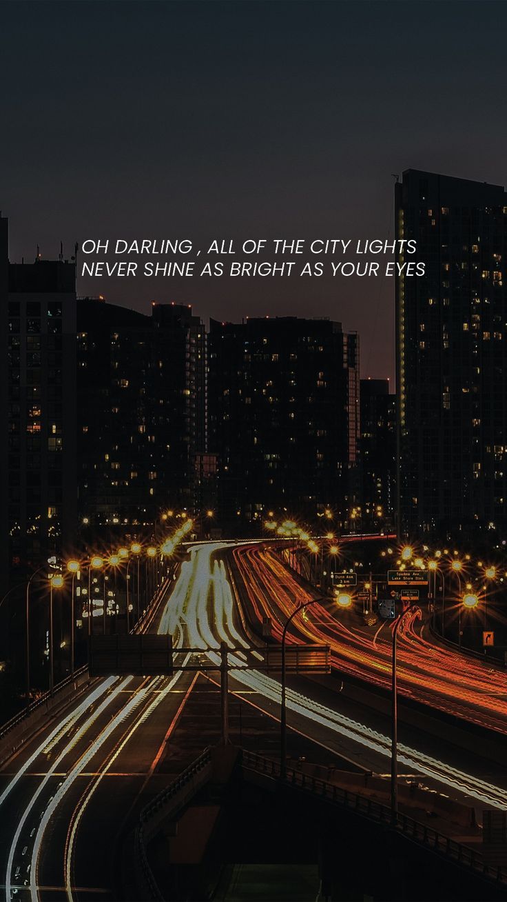 the city lights shine brightly at night with an inspirational quote above it that reads, oh daring, all of the city lights never shine as bright as your eyes