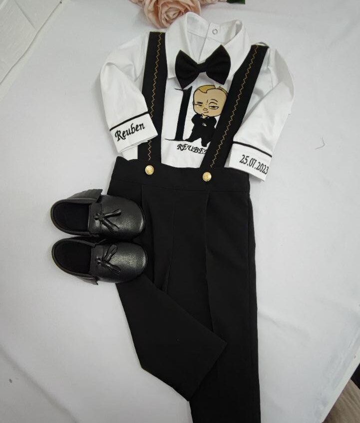 NOTE Please visit my store for many more children's costumes and custom made clothes.. httpsadykidsdesign.etsy.com Please send a message to have the embroidery on the front of the shirt done as you wish. It is prepared specifically for your child in line with your wishes. Just contact me. This cotton Men's Guess First 1st Birthday 4 Piece Suit is custom made with Name and Date of Birth. History Boss Baby Costume Jumpsuits are custom made to order. Boys' bow tie, cotton embroidered shirt, comes w One Year Old Boy Outfits, Boss Baby Costume, Black Tuxedo Suit, Ring Boy, Baby Boy Clothing Sets, Birthday Suit, Baby Boy Birthday, Tuxedo Suit