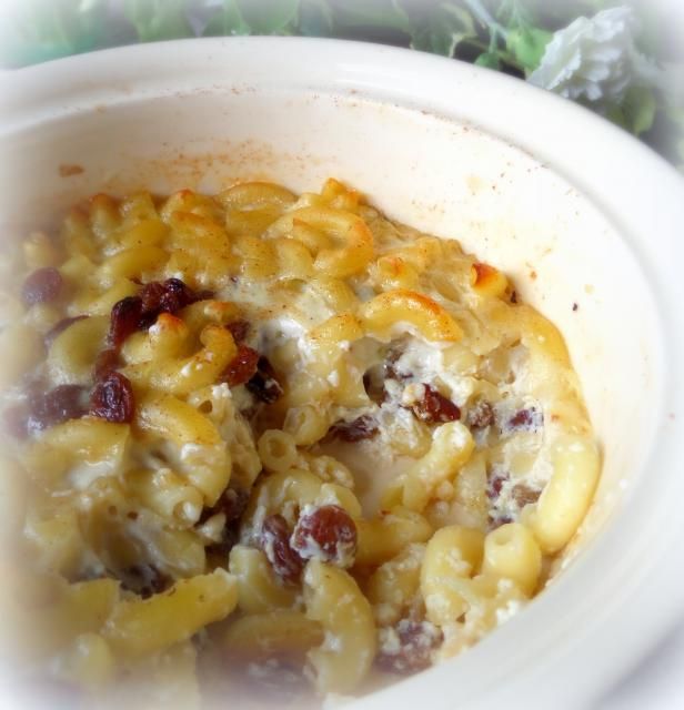 a white bowl filled with macaroni and cheese