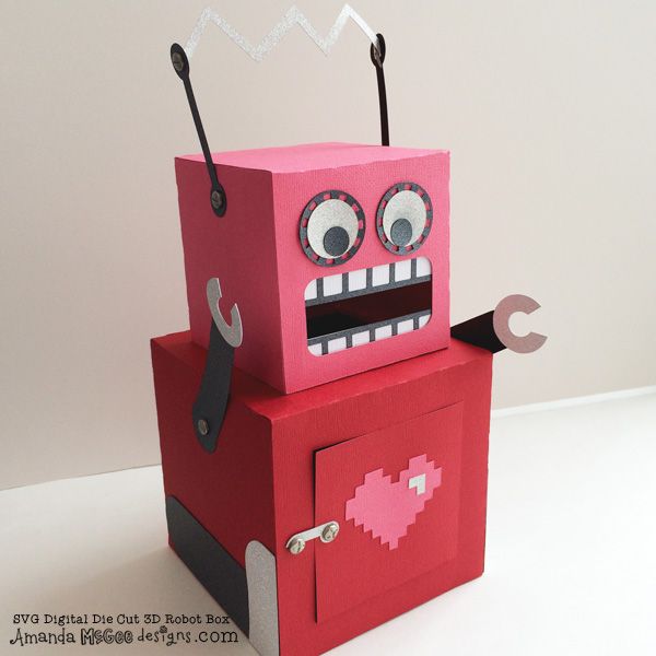 a red box that has some kind of robot on it's head and eyes