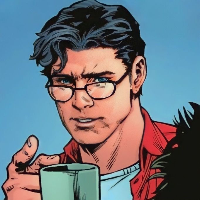 a man with glasses holding a coffee cup