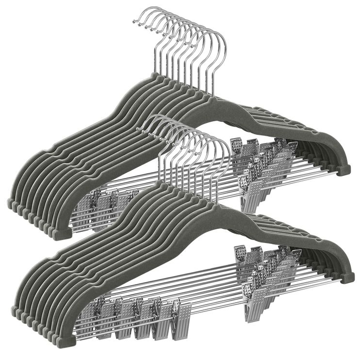 a bunch of clothes hangers that are stacked on top of each other in different positions