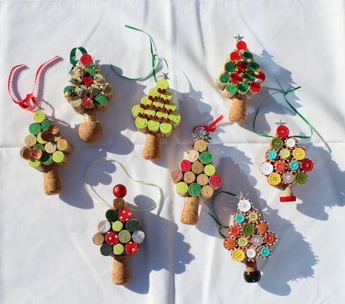 six wine cork christmas tree ornaments on a table