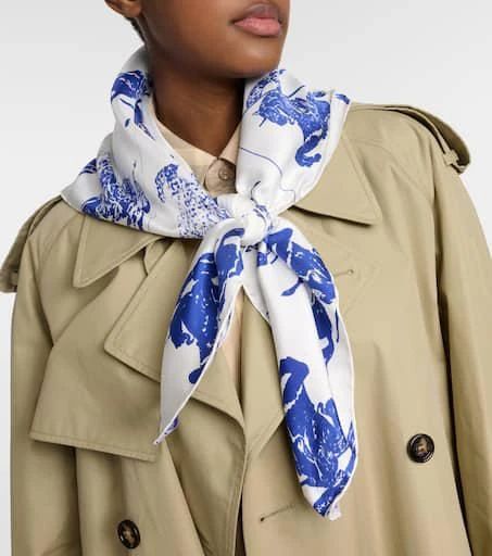 This gorgeous 100% silk scarf from Italy will add a touch of elegance to any outfit. In 'Knight', a rich navy blue silk creates a refined look perfect for photography. The luxurious material and subtle sheen will showcase beautifully in Instagram photos. At 90cm/35.5' square, it is generously sized for versatile styling around the neck or shoulders. Dry clean only for best care of the high quality silk. An investment piece that can be enjoyed for years. Chic White Silk Scarf For Work, Burberry Clothing, Burberry Print, Rich Navy Blue, Burberry Outfit, Printed Silk Scarf, Burberry Accessories, Printed Silk, Blue Silk