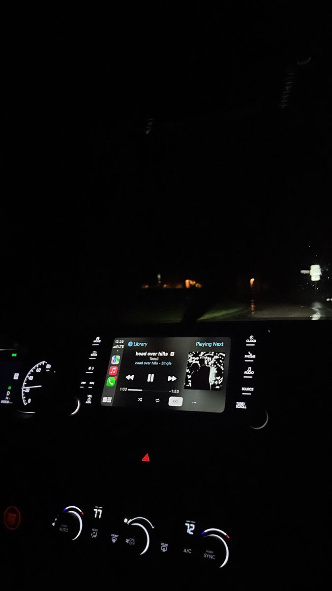 the dashboard of an airplane in the dark