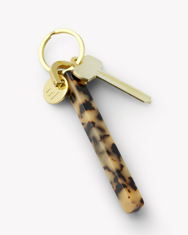 Classic style meets functional fashion in an Italian Acetate bar keychain for Fall 2022. Hardware Color Options: Gold plated or Rhodium plated Total Measurement: 5 inches long Bar Width: .375 inches Ring Diameter: 1 inch Italian Acetate Keychains For Keys, Shell Keychain, Bar Keychain, Accessory Inspo, Classic Bar, Keychain Handmade, What In My Bag, Functional Fashion, Versatile Jewelry