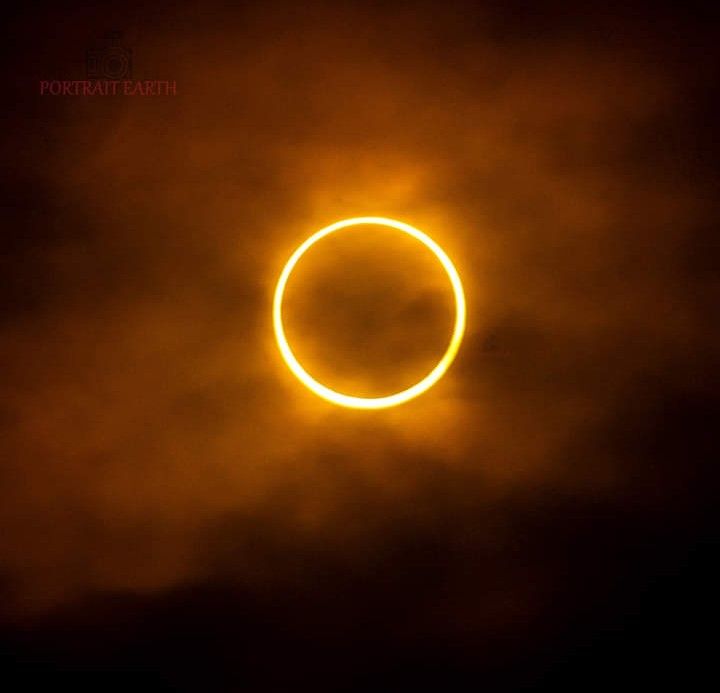 the solar eclipse is seen through clouds in this image