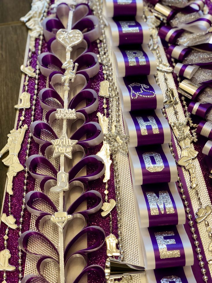 purple and white ribbons with the word hope on them are lined up in rows next to each other