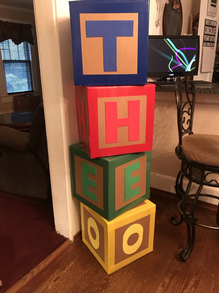 a stack of blocks sitting on top of a hard wood floor