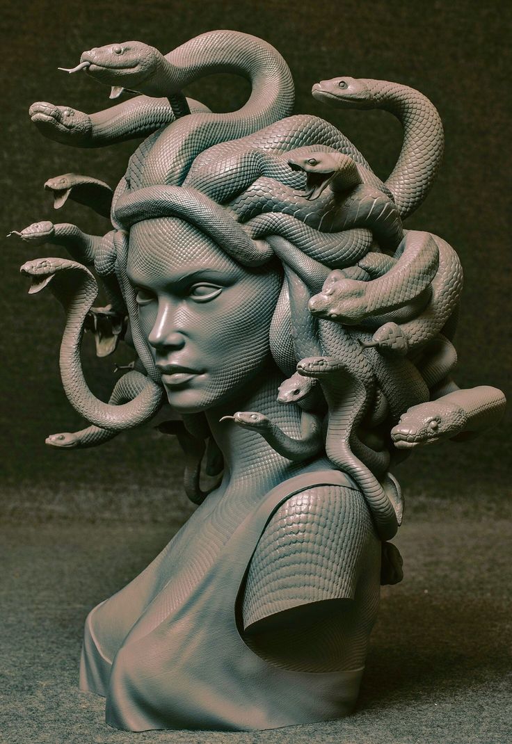 a sculpture of a woman with snakes on her head