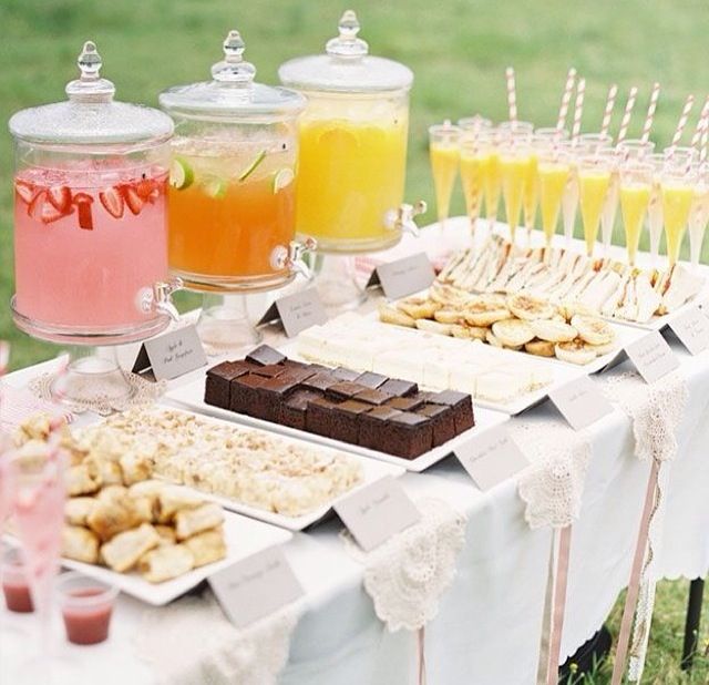 a table topped with lots of desserts and drinks