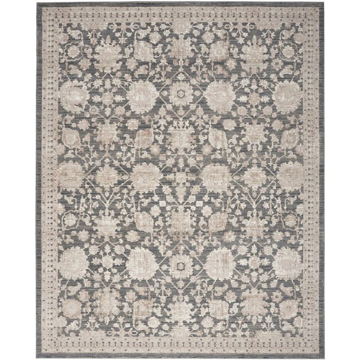 a gray and white rug with an intricate design