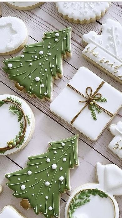 christmas cookies decorated with green and white icing