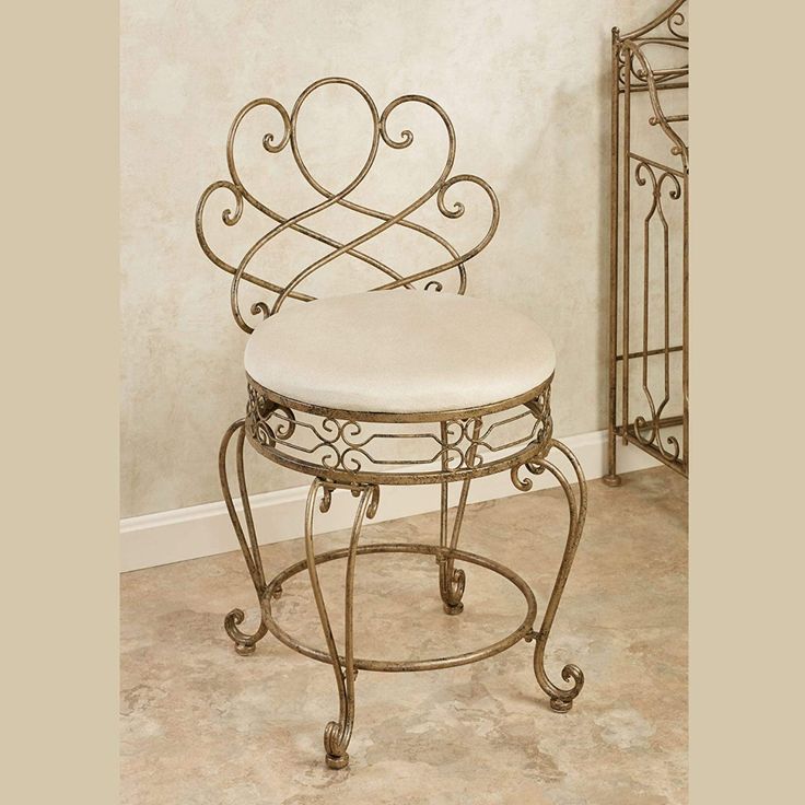 a chair that is next to a wall with a heart design on the back of it