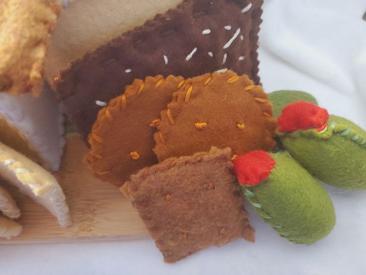 several different types of pastries on a cutting board