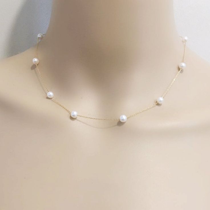 Item No: NK584 Item:sterling silver pearl necklace Pearl shape:round shape Pearl size:5-6mm Pearl color: white Pearl skin: with little flaws Pearl luster: good Pearl quality: AA the space between two pearl: 3.5cm Chain length: 16inch,18inch,20inch,22inch,24inch,26inch,27.5inch Chain: sterling silver with white gold plated, or yellow gold plated Packing: beautiful giftbox, ready for gift giving Please contact Lisha if any more questions. Illusion Pearl Necklace, White Akoya Pearl Necklace With Delicate Chain, White Pearl Necklace With Delicate Chain For Formal Occasions, Minimalist White Chain Necklace For Party, Delicate Pearl Necklace With Round Shape, Delicate White Pearl Drop Chain Necklace, White Pearl Necklace With Delicate Chain For Party, Dainty Pearl White Necklace For Party, Delicate White Pearl Chain Necklace