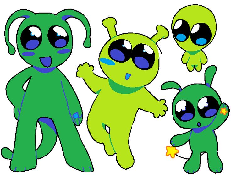 three green alien dolls with blue eyes and one is holding a star in his hand