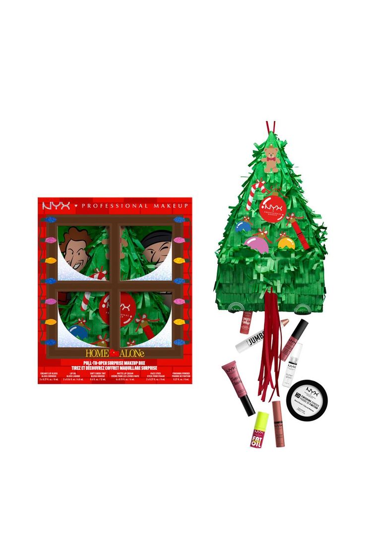 an ornament shaped like a christmas tree next to its box and instructions on how to make it