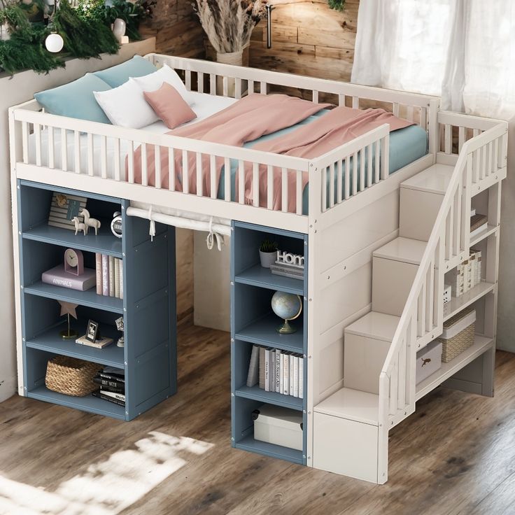 there is a bunk bed with stairs to the top and bookshelves below it