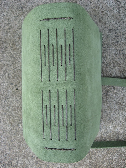 a close up of a green object on the ground