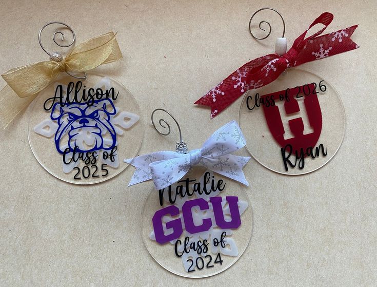 Personalized custom acrylic Christmas ornament. Perfect for college or high school students in your family. Fur baby or any name, saying, mascot, design, or colors you would like. Beads and ribbon can also be personalized to your preference. Just let me know in the personalization and I will design whatever you would like.  Round 3 inch acrylic circle, permanent adhesive vinyl, silver hanger included. Acrylic Ornaments Vinyl, College Ornaments, Ornaments Vinyl, School Ornaments, Cricut Ornaments, Family Ornament, Mascot Design, Animal Ornament, School Students