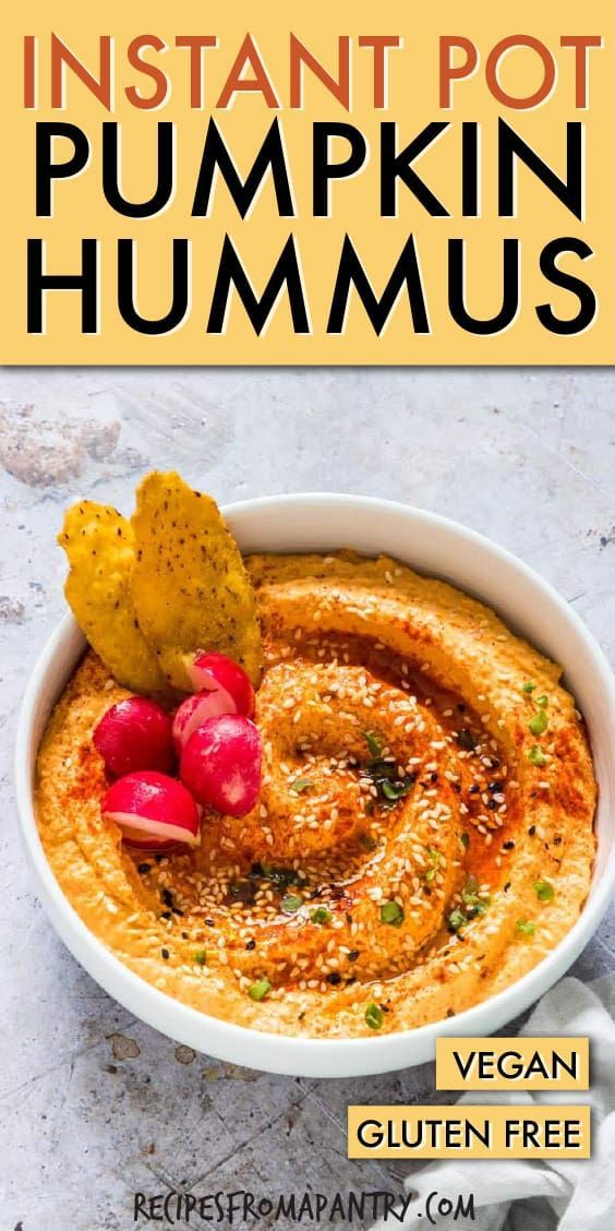 the cover of instant pot pumpkin hummus is shown in a bowl with chips on top