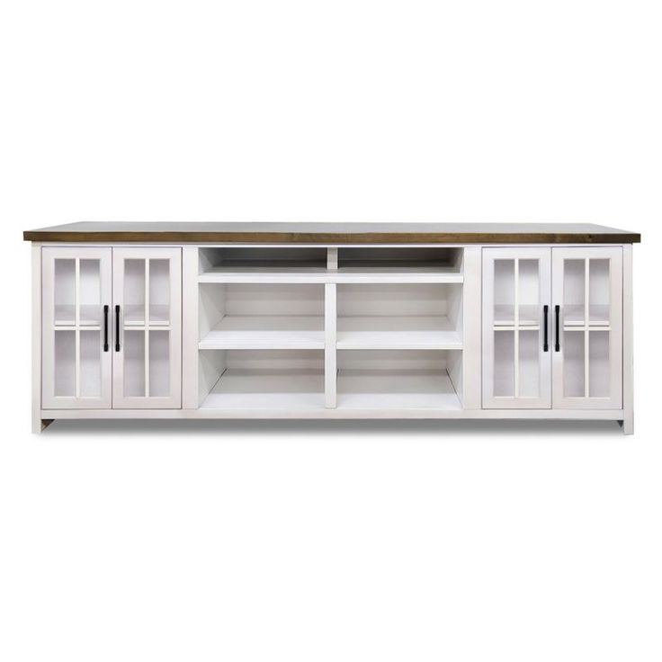 a white entertainment center with glass doors