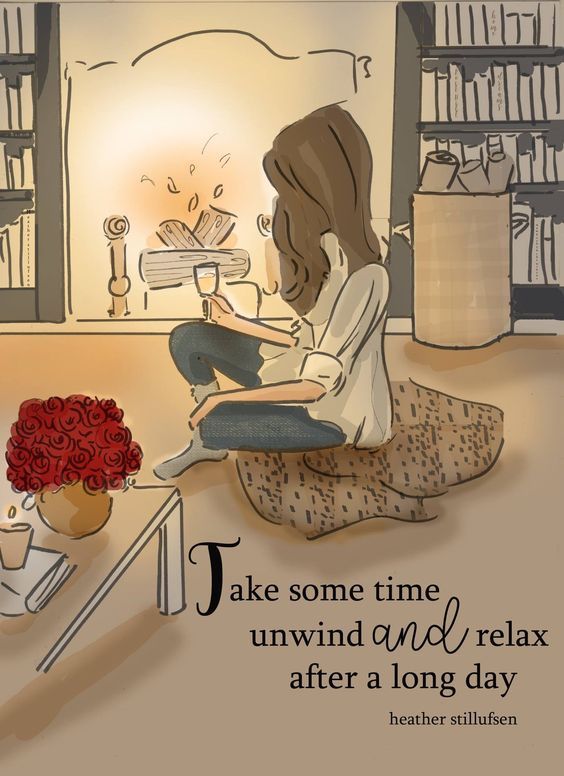 a woman sitting on the floor in front of a book shelf filled with books and flowers