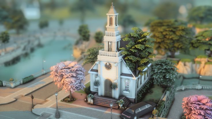 a model of a church with trees in the foreground and water in the background