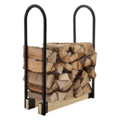 a stack of logs sitting next to each other on a metal rack with black handles