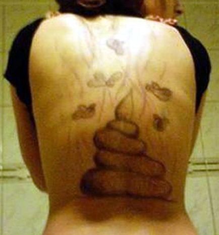 the back of a woman with tattoos on her body