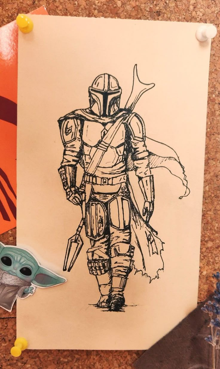 a paper with a drawing of a boba fett on it