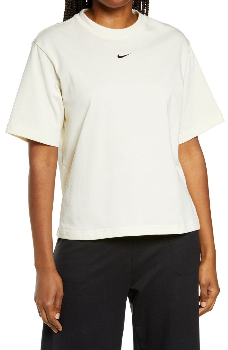 This T-shirt made from heavyweight cotton jersey with a boxy, throwback fit is an easy pick to pair with your favorite wardrobe essentials. Style Name:Nike Sportswear Essential T-Shirt. Style Number: 6136692. Nordstrom Store, Nike Sportswear, Coconut Milk, Wardrobe Essentials, White Undershirt, Womens Tees, High Fashion, Nike Women, Shirt Style