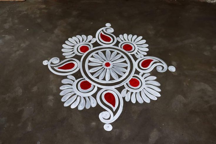 a white and red design on the ground