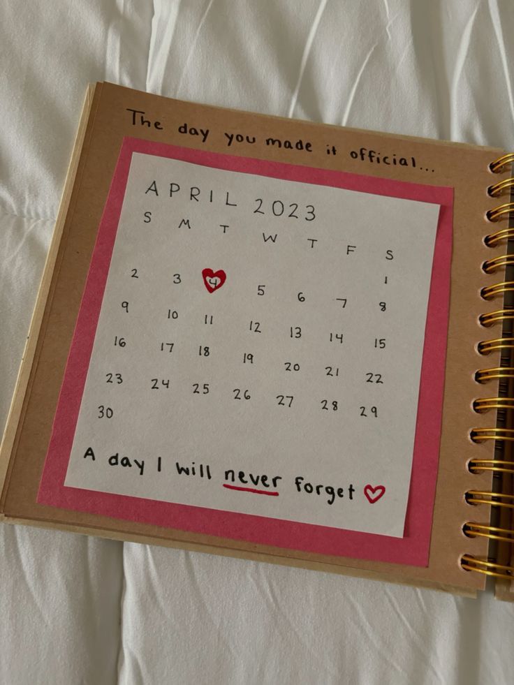 a calendar with the date on it is placed in a book that says, this day you may be officia