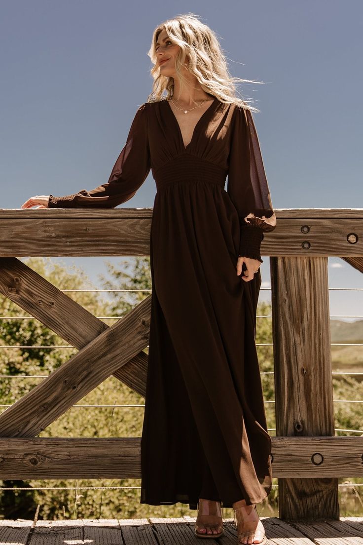 Looking for the perfect long sleeve black maxi dress? This is it! Our Olivia Maxi Dress in dark brown is stunning. You'll wear it again and again! Baltic Born Olivia Dress, Chocolate Brown Bridesmaid Dress, Brown Dresses Formal, Long Sleeve Black Maxi Dress, Maxi Dress Dark, Chocolate Brown Dress, Dark Brown Dress, Brown Bridesmaid Dresses, Winter Wedding Guest Dress