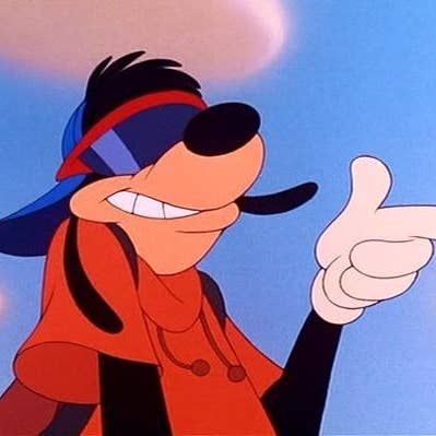 goofy pointing at something in the air