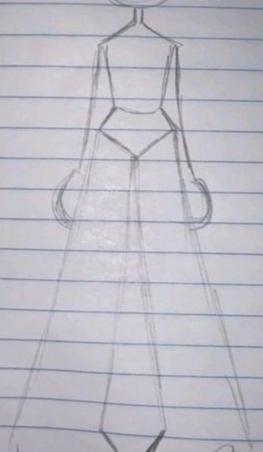 a drawing of a dress on lined paper