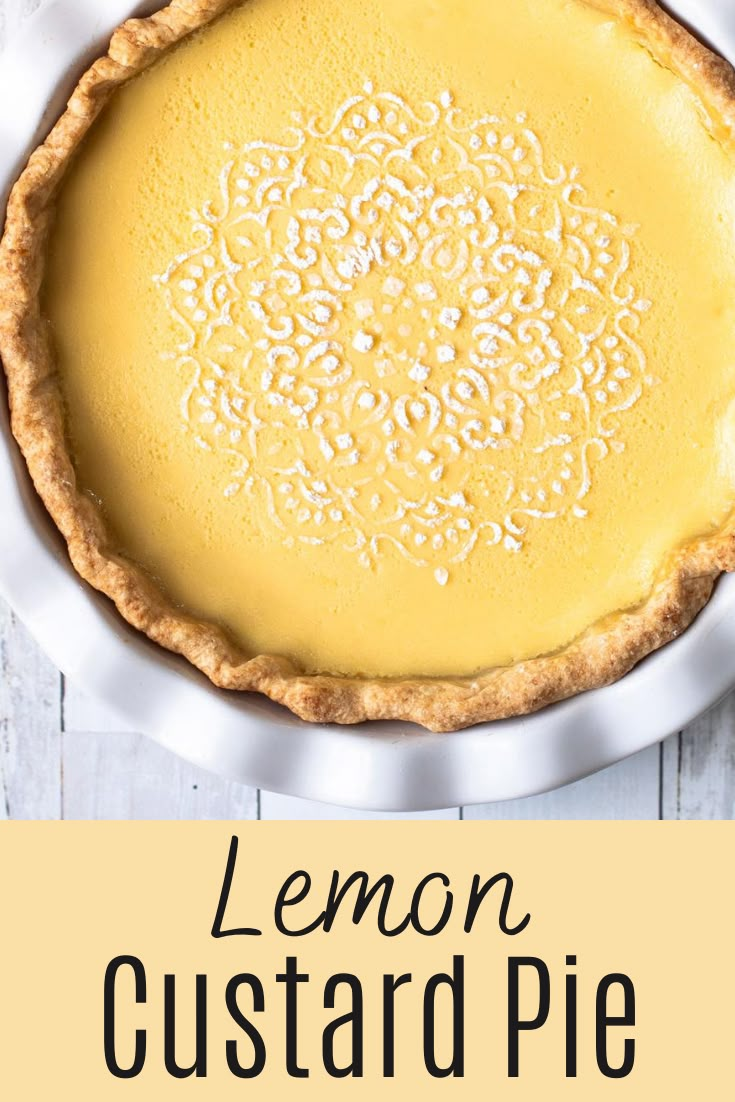 a lemon custard pie on a white plate with the words lemon custard pie