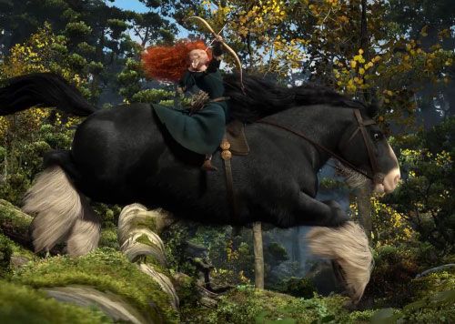 a red headed woman riding on the back of a black horse in a lush green forest