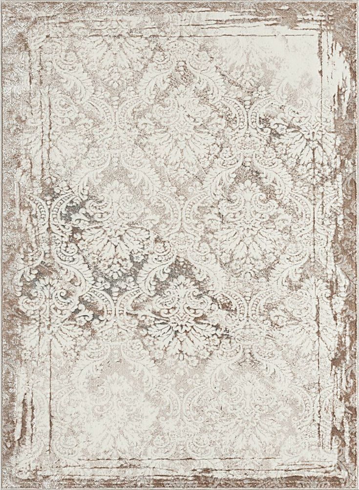 the back side of a piece of fabric with an ornate design in brown and white