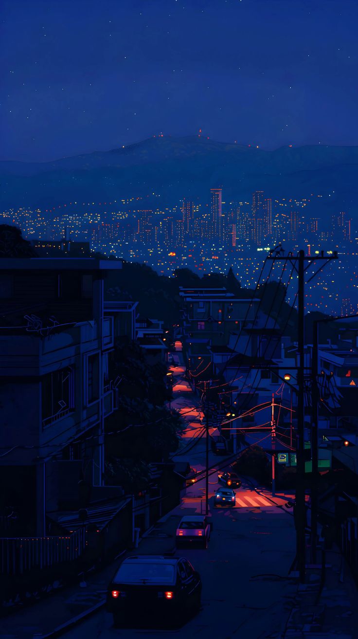 the city lights shine brightly in the dark night sky as cars drive down an urban street