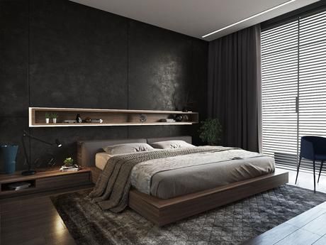 a modern bedroom with black walls and wooden flooring, along with a large bed that has built - in shelves on the wall