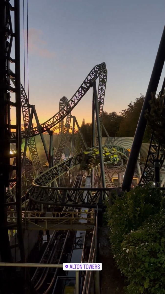 the roller coaster at six flags amusement park in atlanta, georgia during sunset or sunrise