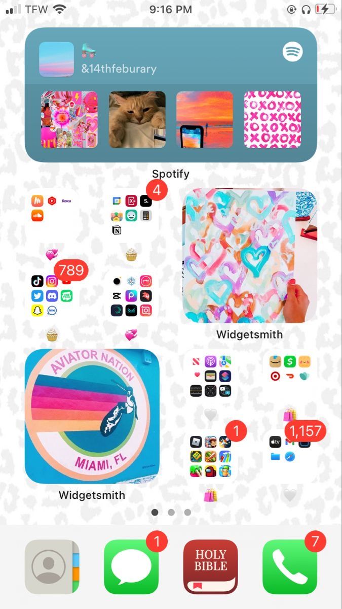 an iphone screen with various stickers on it